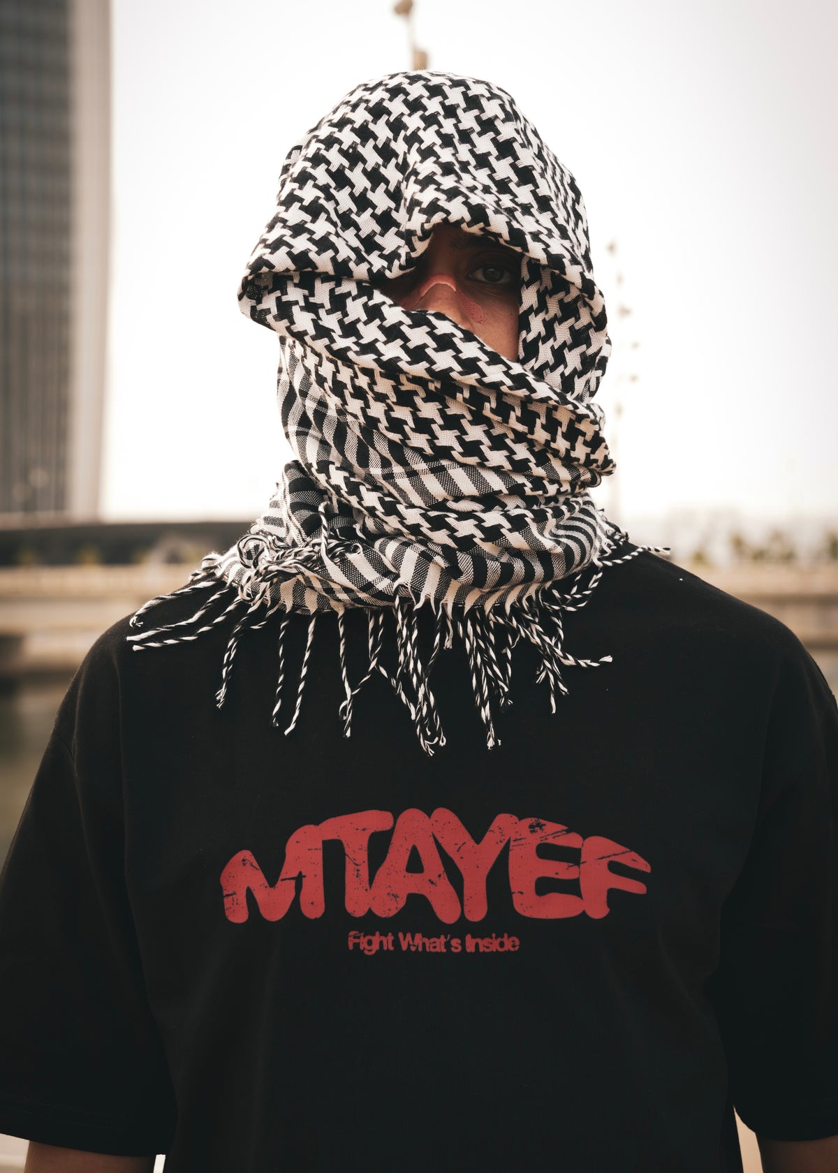 MTAYEF black oversized T-shirt with red graphic on the front